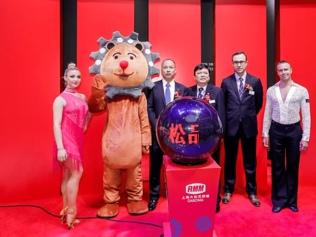 RMM Dasong brand mascot and international guests at product launch ceremony during SinoCorrugated exhibition