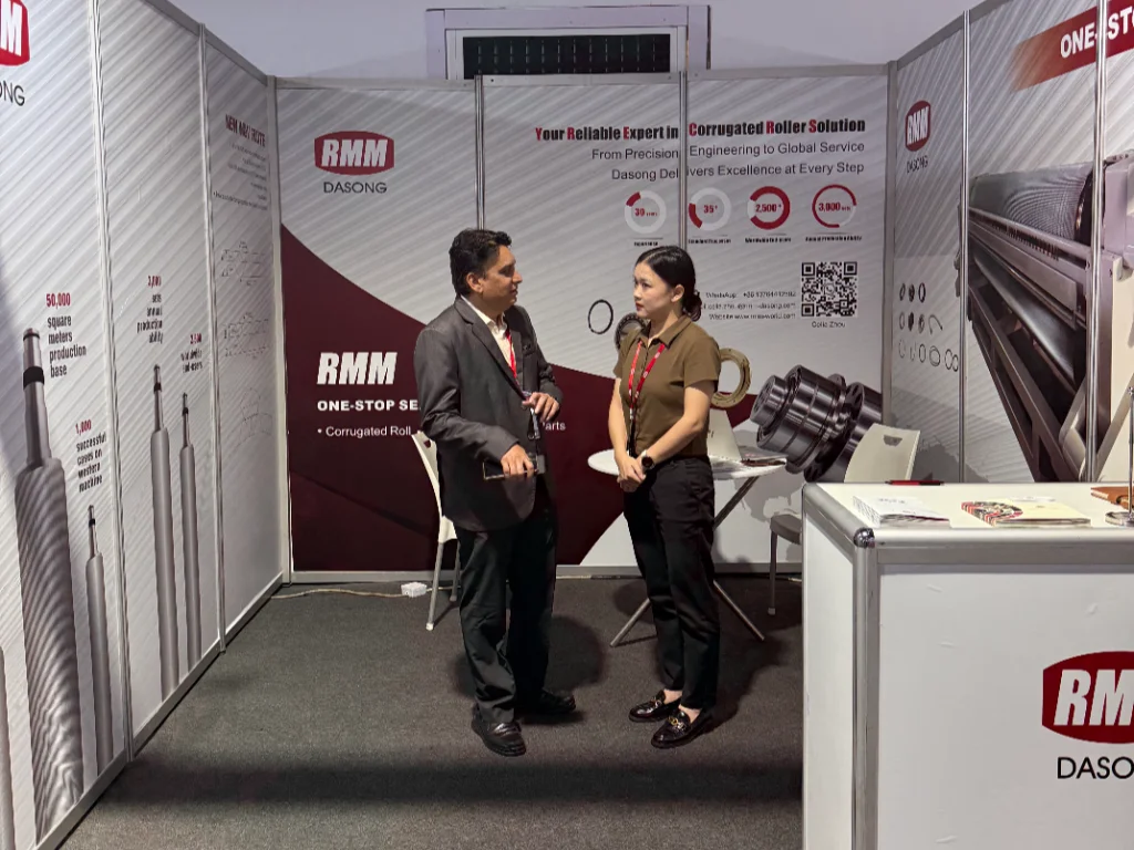 RMM salesperson Celia communicating with customers at Nigeria ProPak 2025 exhibition site