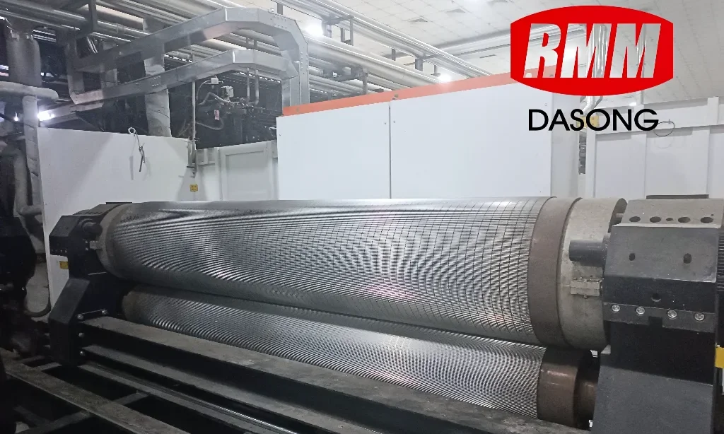 Industrial corrugating roll assembly (RMM/DASONG branded) – key component for corrugated board production, highlighting the need for routine maintenance