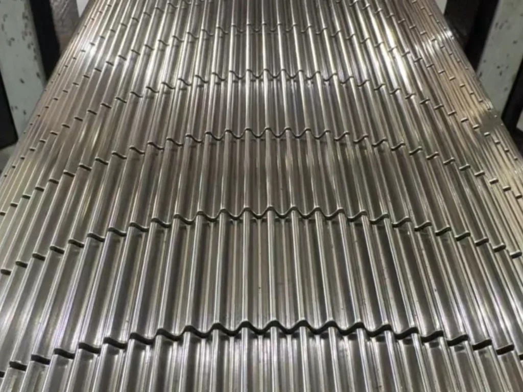 Tungsten carbide corrugating roll close-up showing high precision flute profile and wear-resistant surface