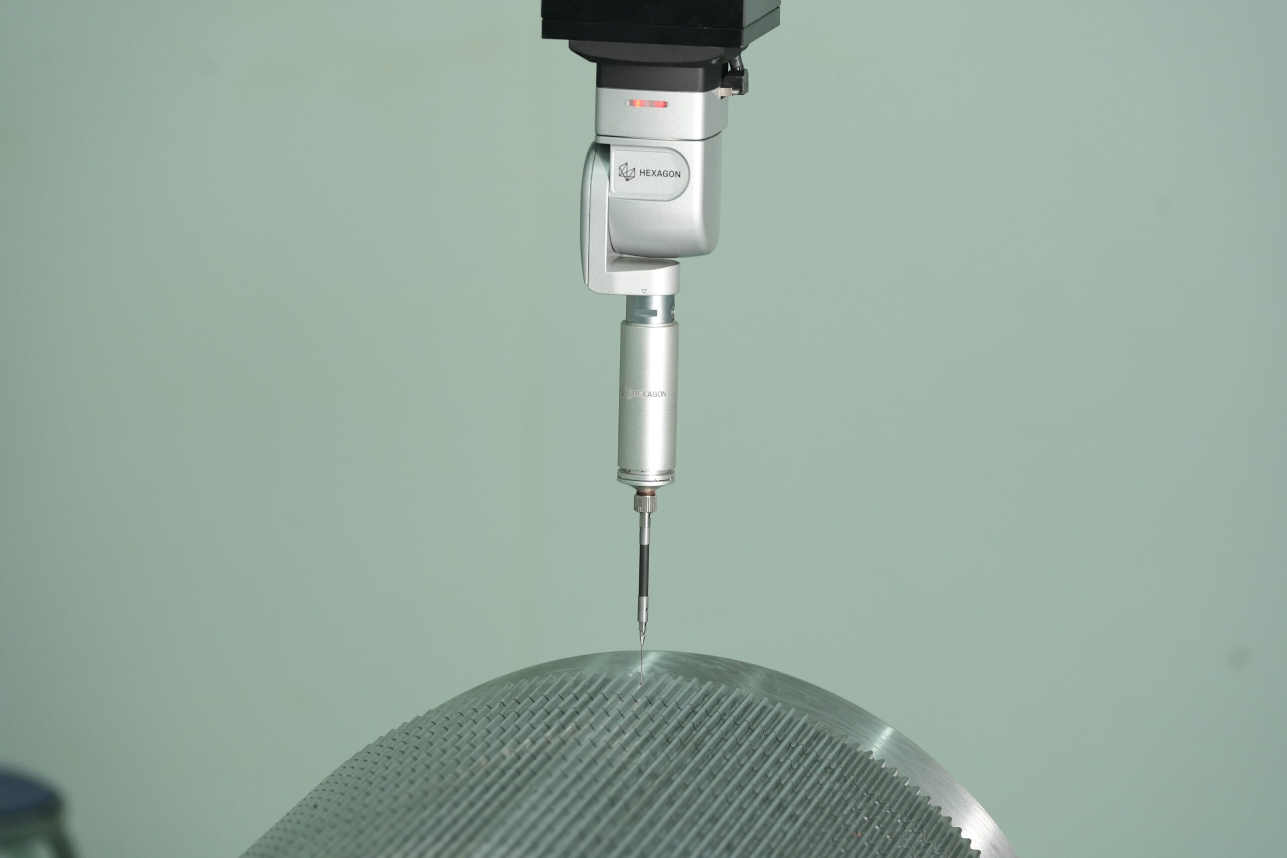 An RMM corrugating roll being measured with high-precision instruments