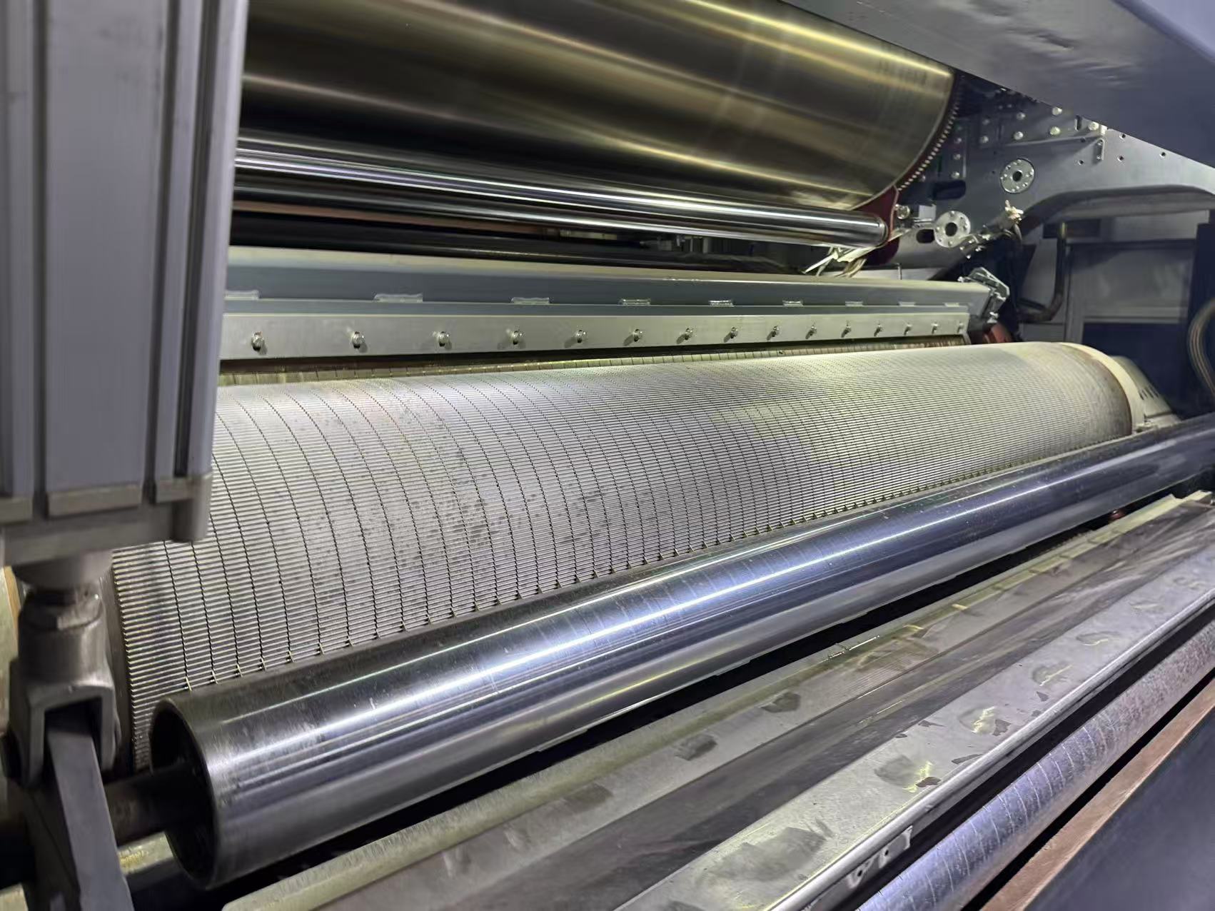 A clean and well-maintained corrugating machine in a factory setting